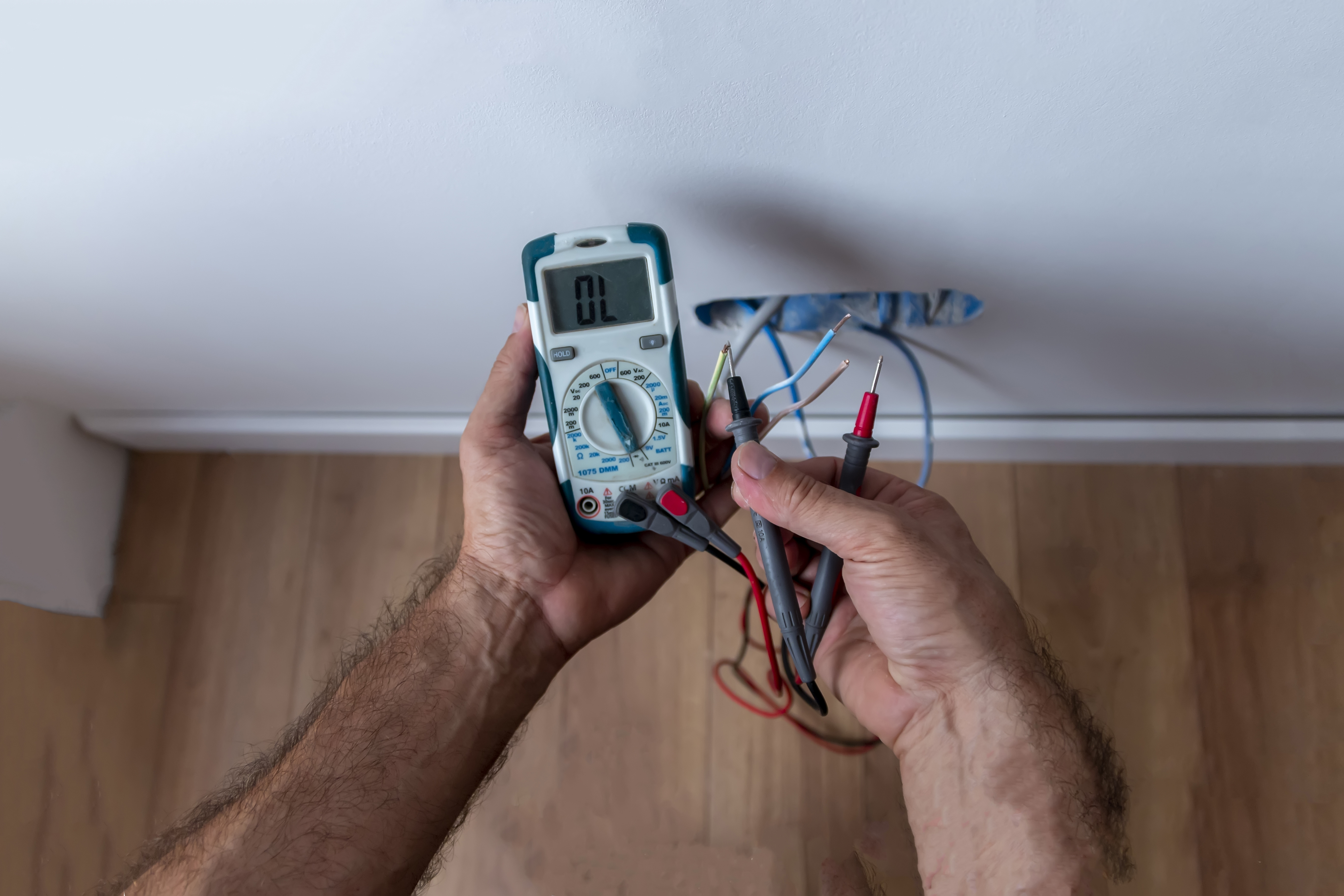 MSA electrician using multimeter for electrical fault finding
